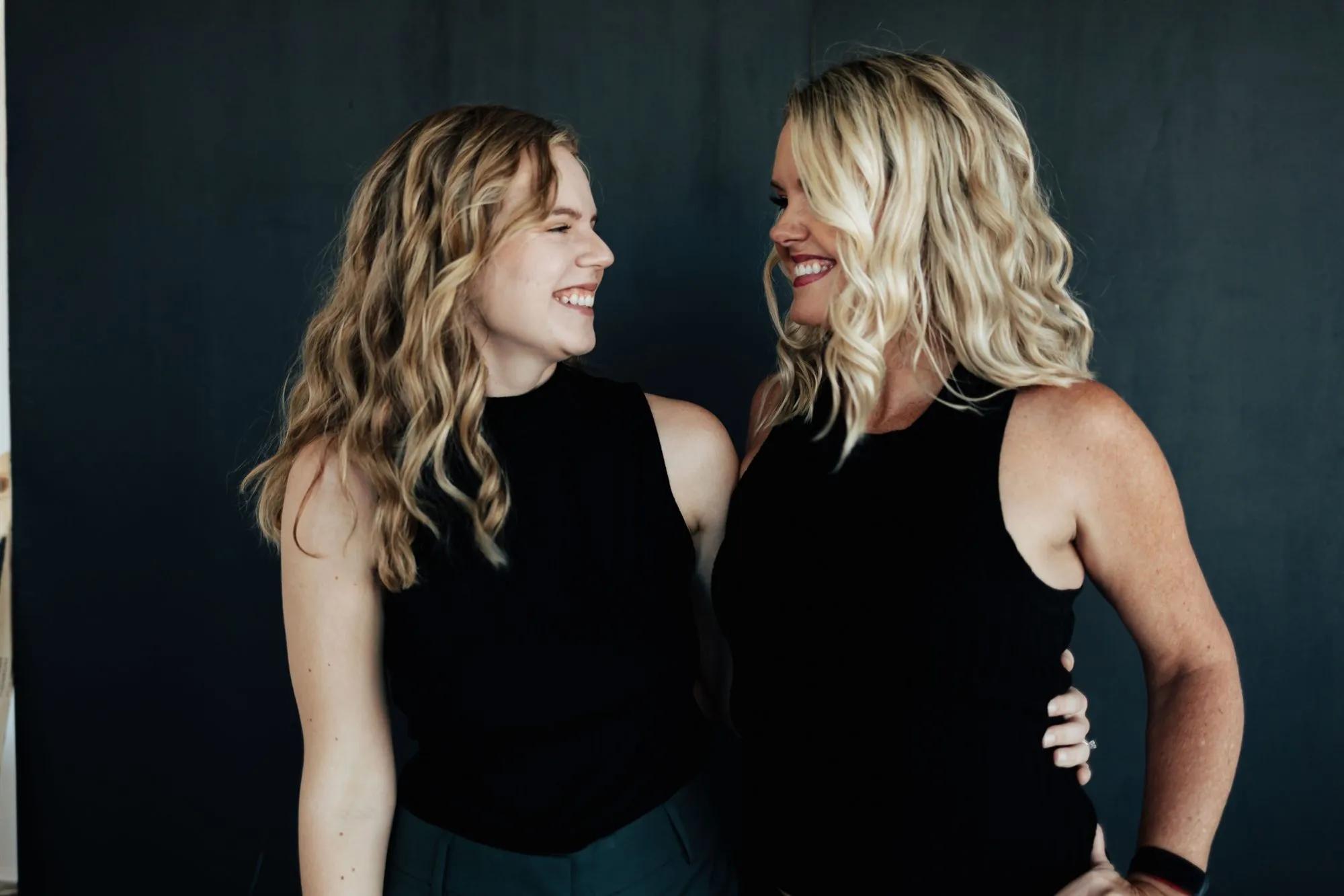 Amy and Julia of JuJu Lee Events smiling at one another